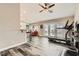 Open living space features modern flooring, ample light, and a doorway to a dining and kitchen area at 6908 Bienville St, Las Vegas, NV 89131