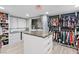 Bright walk-in closet featuring built-in storage and hanging racks at 7 Sturm St, Henderson, NV 89015