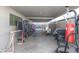 Open garage featuring recreational equipment at 7 Sturm St, Henderson, NV 89015