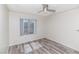 Sunlit bedroom showcasing a large window that fills the space with natural light at 7100 Pirates Cove Rd # 2065, Las Vegas, NV 89145