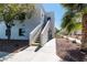 Well maintained building exterior with stairs leading to upper floors, lush landscaping at 7100 Pirates Cove Rd # 2065, Las Vegas, NV 89145