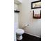 A half bath featuring neutral tones and towel rack at 7257 Early Pioneer Ave, Las Vegas, NV 89129