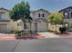 Two-story home featuring manicured landscaping and an attached garage at 7257 Early Pioneer Ave, Las Vegas, NV 89129