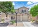 Charming two-story home with a well-manicured lawn and a classic architectural design at 7257 Early Pioneer Ave, Las Vegas, NV 89129