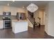 A modern kitchen features stainless steel appliances and a center island at 7257 Early Pioneer Ave, Las Vegas, NV 89129
