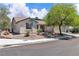 Well-maintained house exterior with desert landscaping at 7870 Midnight Ride St, Las Vegas, NV 89131