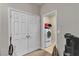 Convenient laundry area with washer, dryer, storage and closet at 7870 Midnight Ride St, Las Vegas, NV 89131