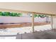 Covered back patio overlooking the backyard at 8205 Harrogate Ave, Las Vegas, NV 89129