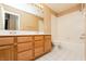 Bathroom featuring double sinks, bathtub and shower with a white tiled floor at 8205 Harrogate Ave, Las Vegas, NV 89129