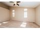 Spacious bedroom with multiple windows and neutral carpeting at 8205 Harrogate Ave, Las Vegas, NV 89129