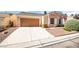 Charming single-story home with a two car garage and desert landscaping at 8205 Harrogate Ave, Las Vegas, NV 89129