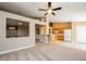 Open concept living area seamlessly connects to the kitchen and dining spaces at 8205 Harrogate Ave, Las Vegas, NV 89129
