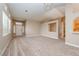 Inviting living room with large windows offering abundant natural light at 8205 Harrogate Ave, Las Vegas, NV 89129
