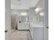 Bright bathroom showcasing dual vanities, marble floors, and a spacious walk-in shower at 8958 Howell St, Las Vegas, NV 89166