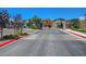 Gated community entrance ensures privacy and security, offering a peaceful and well-maintained environment for residents at 8958 Howell St, Las Vegas, NV 89166