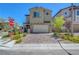 Charming two-story home features a two-car garage, landscaped yard and inviting curb appeal in a desirable location at 8958 Howell St, Las Vegas, NV 89166