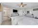 Serene main bedroom with a spacious layout, stylish furnishings and an adjoining bathroom at 8958 Howell St, Las Vegas, NV 89166