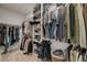 A generously sized walk-in closet with shelving and hanging rods provides ample storage space at 8958 Howell St, Las Vegas, NV 89166