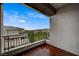 Balcony with wood floors overlooking neighborhood at 9201 Tesoras Dr # 401, Las Vegas, NV 89144