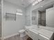 Bathroom featuring grey tile floors, modern vanity, and glass enclosed shower at 9201 Tesoras Dr # 401, Las Vegas, NV 89144