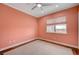 Bedroom featuring neutral carpet, a ceiling fan, and a window at 9201 Tesoras Dr # 401, Las Vegas, NV 89144