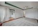 Bright open bedroom with hardwood floors and slider door to balcony at 9201 Tesoras Dr # 401, Las Vegas, NV 89144