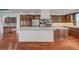 Spacious kitchen island featuring stone countertop, custom cabinets and stainless appliances at 9201 Tesoras Dr # 401, Las Vegas, NV 89144