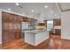 Gourmet kitchen featuring a large island, stainless steel appliances, and custom cabinetry at 9201 Tesoras Dr # 401, Las Vegas, NV 89144