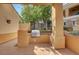 Enjoy outdoor cooking with this built-in gas grill, under a covered patio, set amongst mature landscaping at 9201 Tesoras Dr # 401, Las Vegas, NV 89144