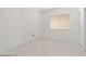 Clean bedroom with tile floors, offering a practical and modern look at 9247 Tulip Trestle Ave, Las Vegas, NV 89148
