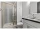 Modern bathroom with a glass-enclosed shower, stylish vanity, and contemporary fixtures at 9430 Isla Lee Ave, Las Vegas, NV 89178