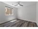 Bright bedroom showcasing a modern ceiling fan and natural light at 9430 Isla Lee Ave, Las Vegas, NV 89178