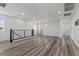 Bright bonus room with neutral walls and luxury vinyl plank flooring at 9430 Isla Lee Ave, Las Vegas, NV 89178