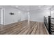 Upstairs bonus room featuring wood flooring and neutral walls at 9430 Isla Lee Ave, Las Vegas, NV 89178