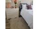 Bedroom with a comfortable bed, a cozy rug, and an eye-catching vase of flowers at 9589 Comiskey Ct, Las Vegas, NV 89148