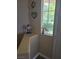 Hallway nook with Las Vegas decor next to a window at 9589 Comiskey Ct, Las Vegas, NV 89148