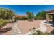 Expansive backyard featuring desert landscaping, mature trees, and a peaceful setting at 9800 Rosamond Dr, Las Vegas, NV 89134