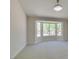 Spacious bedroom with a large bay window and neutral carpet at 9800 Rosamond Dr, Las Vegas, NV 89134