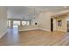 Open living space with wood-look floors and easy access to multiple rooms at 9800 Rosamond Dr, Las Vegas, NV 89134
