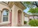 Beautifully framed front entrance with desert landscaping at 9893 Santa Ponsa Ct, Las Vegas, NV 89178