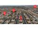 Wide aerial view of residential area with mountain backdrop, nearby cross streets identified by red pins at , Las Vegas, NV 89113