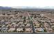 Wide aerial shot of neighborhood, showcasing houses and street layout at , Las Vegas, NV 89113