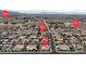 Wide aerial shot of neighborhood, pinpointing location on map at , Las Vegas, NV 89113