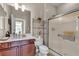 Bathroom featuring modern vanity, toilet, and glass-enclosed shower at , Las Vegas, NV 89113