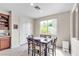 Cozy breakfast nook with table and chairs near a bright window at , Las Vegas, NV 89113