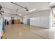 Bright garage with epoxy flooring, plenty of storage cabinets, and access to the side yard at , Las Vegas, NV 89113
