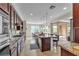 Open-concept kitchen with stainless appliances, granite countertops, and a center island with bar seating at , Las Vegas, NV 89113