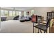 Spacious living room featuring a bar, comfortable seating, and plenty of natural light at , Las Vegas, NV 89113