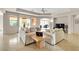 Spacious living room filled with natural light, neutral-toned sofas, and sleek tile flooring at , Las Vegas, NV 89113