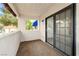 Private balcony featuring sliding glass door access and stucco construction at 101 Luna Way # 222, Las Vegas, NV 89145